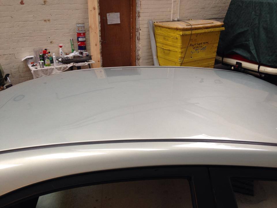 Car Silver Roof Dent Repair - After